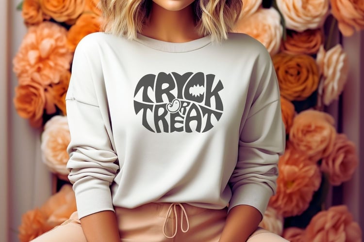 This design features the words Trick or Treat creatively made into the shape of a pumpkin, perfect for Halloween.