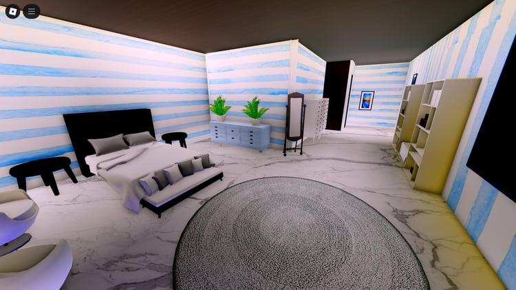 Furnished living room interior with large windows