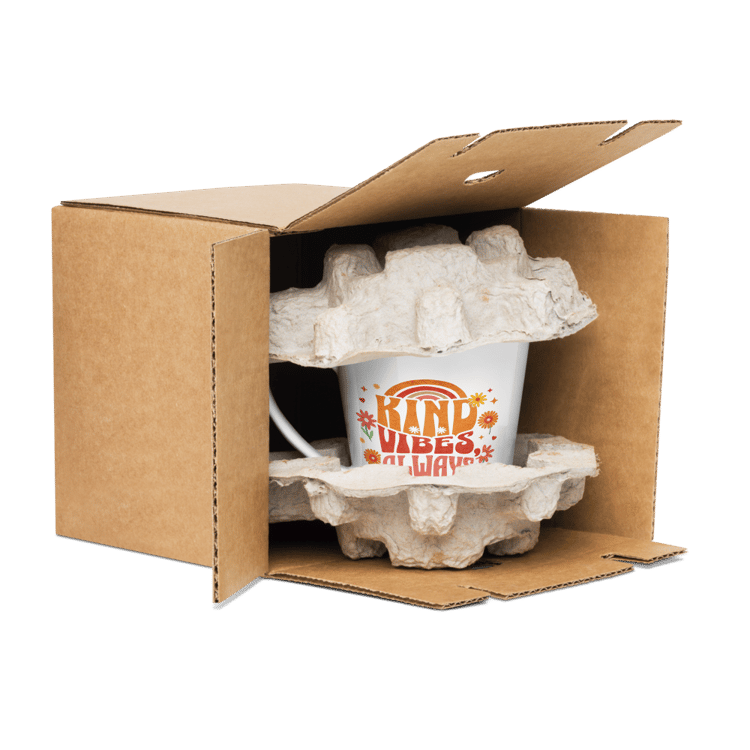 White ceramic latte mug with retro typography that says “Kind Vibes, Always.”