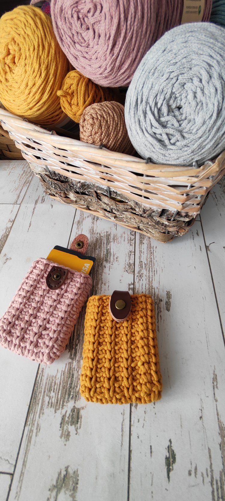 Four-colour collection of rope-yarn minimalist handbags (black, denim blue, mustard, dusty rose) arranged side by side, luxury handmade vibe