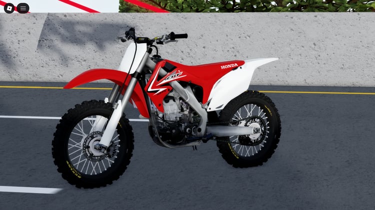 crf 450 motocross bike on a dirt track in roblox