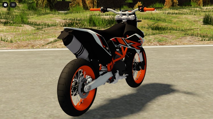 Player riding KTM supermoto bike on street