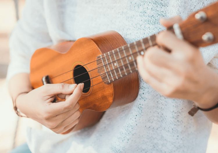 Playing a soprano ukulele