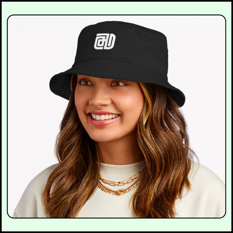 Minimal Arabic Kufi typography “Helm” (Dream) embroidered on a bucket hat