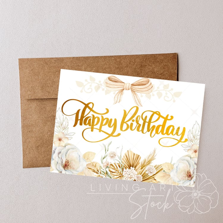 This high-quality digital illustration features a sophisticated "Happy Birthday" message in shimmering gold foil script. The design is framed by a delicate watercolor arrangement of cream-colored roses, dried pampas grass, and golden monstera leaves, evok