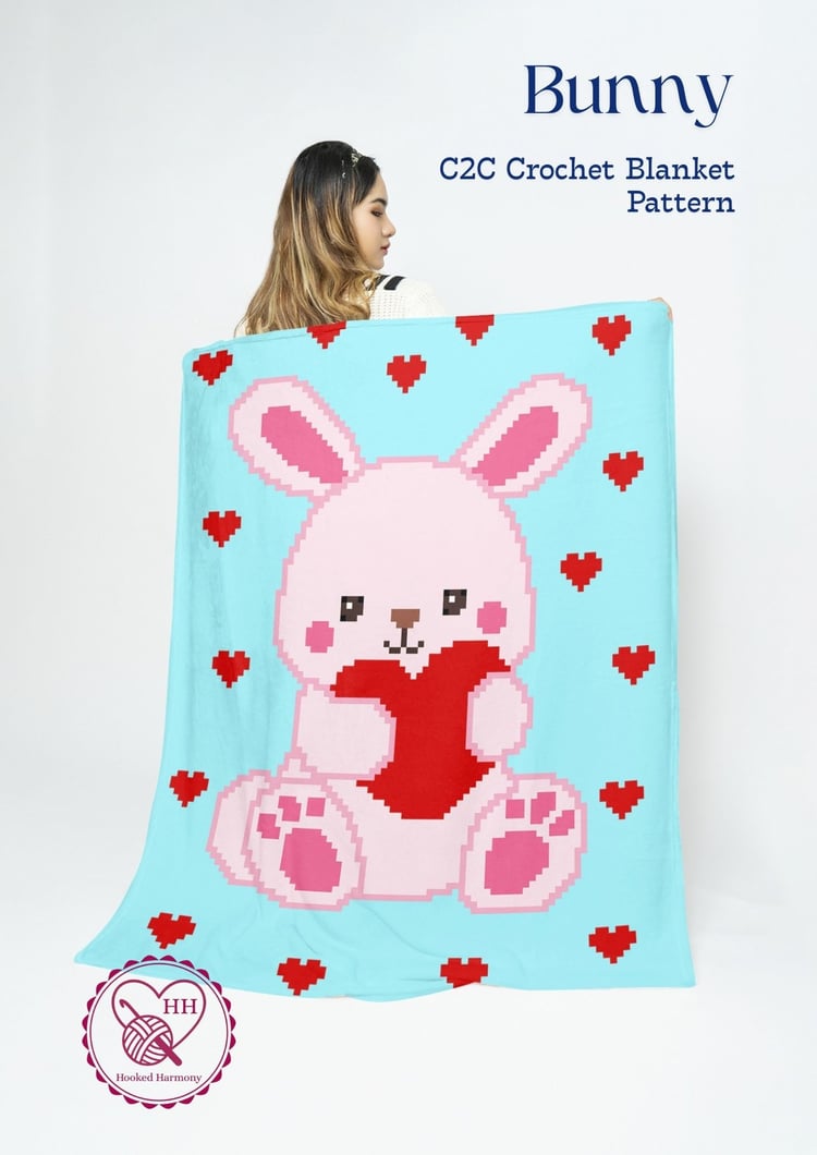 Valentine bunny C2C crochet blanket pattern cover with pink bunny holding heart on mint background