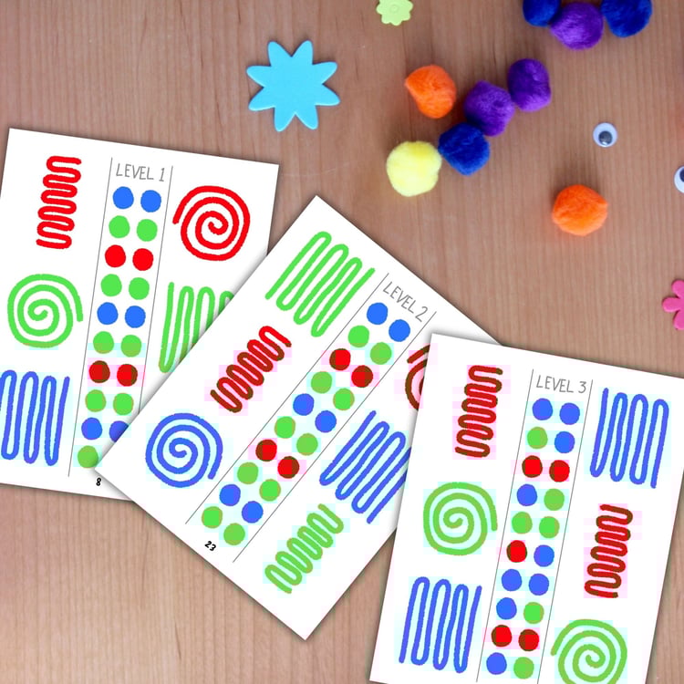 Hand Pop printable bilateral coordination games for kids with three levels of hand movement paths on paper.