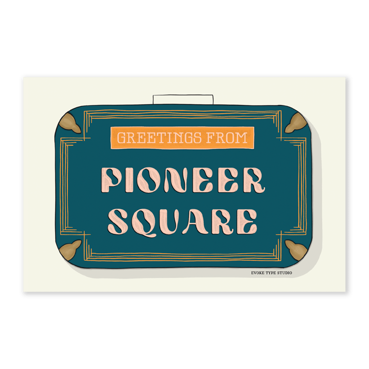 A postcard of a vintage style suitcase with the words “Greetings from Pioneer Square” drawn in unique lettering styles. Artwork has a dark blue and bright yellow color scheme