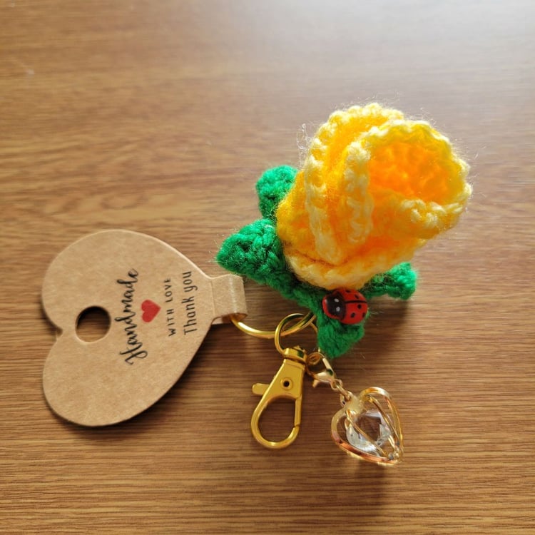 Crochet yellow rose keyring wrapped as mini bouquet with ladybug and crystal heart charm