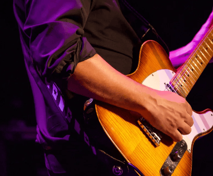 playing the electric guitar