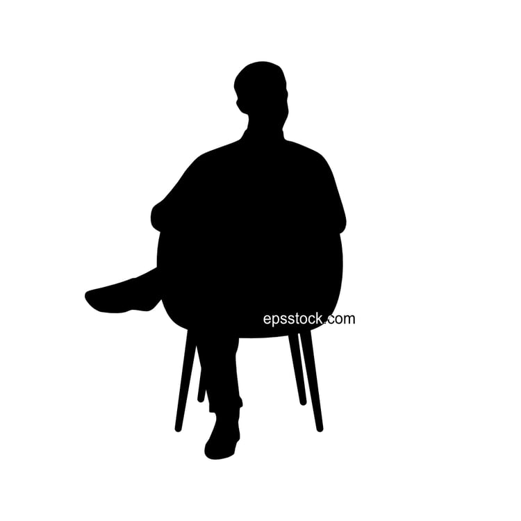 a man is sitting on a chair