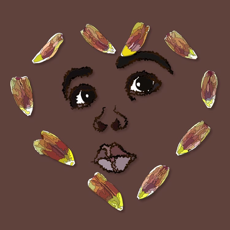 petals in the shape of a heart around baby face