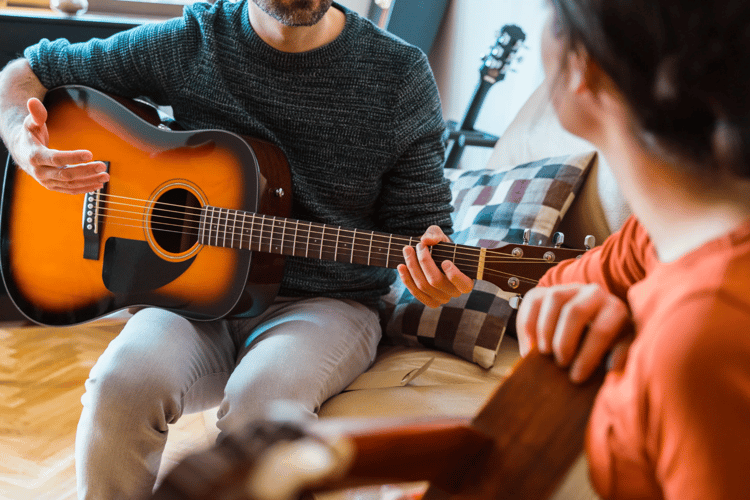 Teaching acoustic guitar