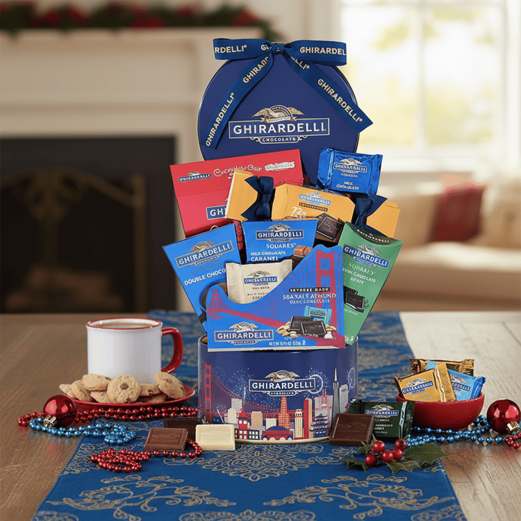 Ghirardelli chocolate gift set with a mug and cookies on a table.