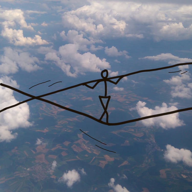 figure walking a tightrope