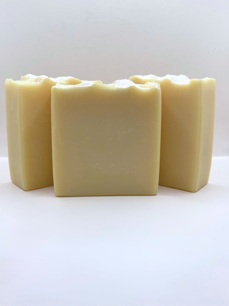 Three handmade soap bars topped with sea salt