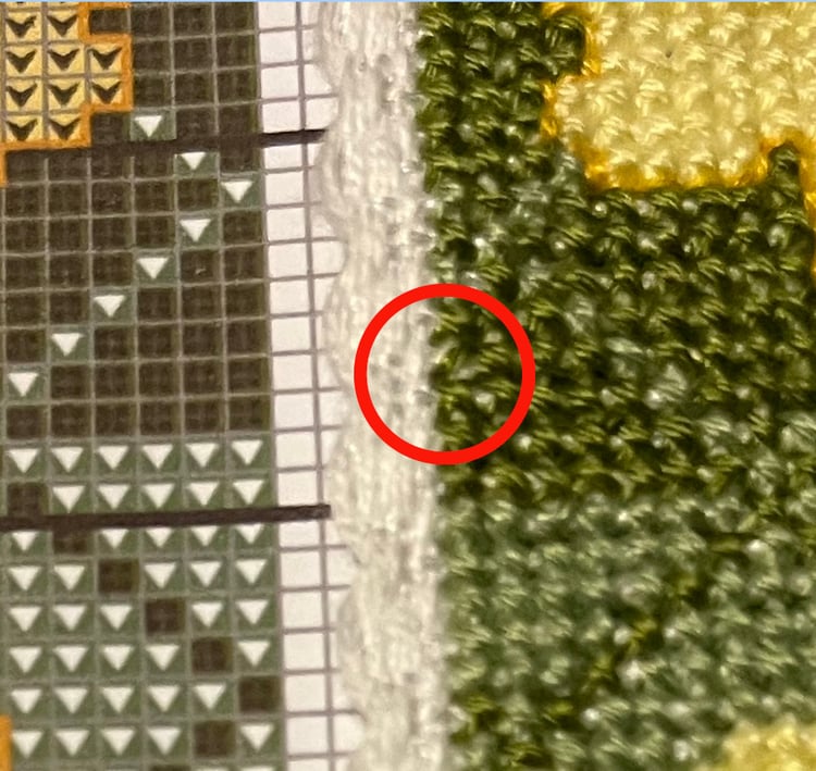 close up of unintended half cross stitch