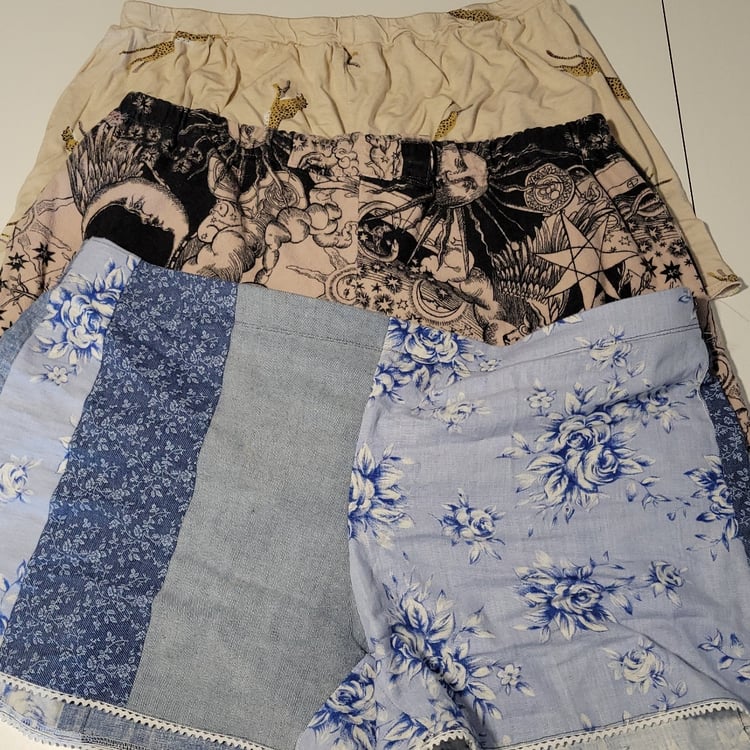 Three pairs of homemade shorts with different types of elastic waistbands