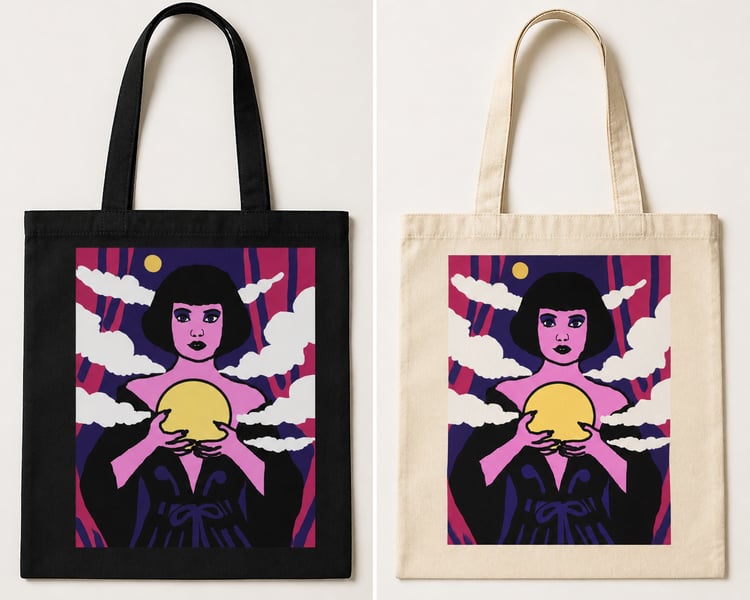 Black tote bag featuring a stylised portrait of a woman holding a glowing yellow orb surrounded by clouds and a colourful sky
