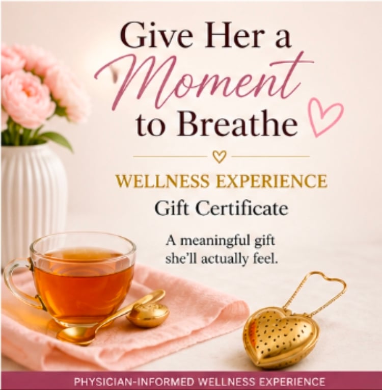 A soft, elegant wellness-themed image featuring a cup of herbal tea with a gold spoon and heart-shaped infuser, alongside the text “Give Her a Moment to Breathe – Wellness Experience Gift Certificate,” conveying a calming, thoughtful self-care gift.