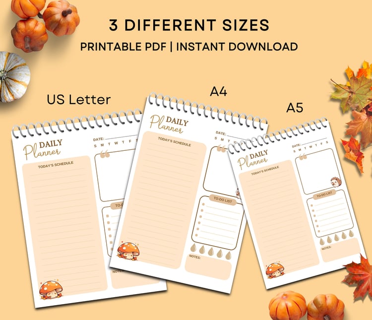 Printable daily planner templates in A4, A5, and US Letter sizes, autumn design with pumpkins and mushrooms, showing sections for date, schedule, to‑do list, and notes.