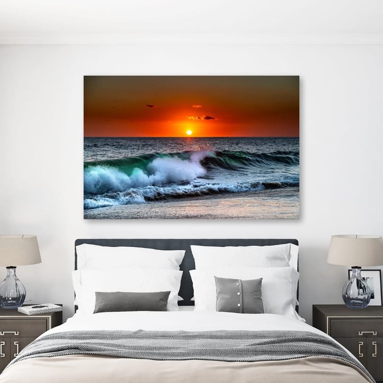 Large canvas wall art of Puerto Escondido sunset wave hanging above bed in modern bedroom"