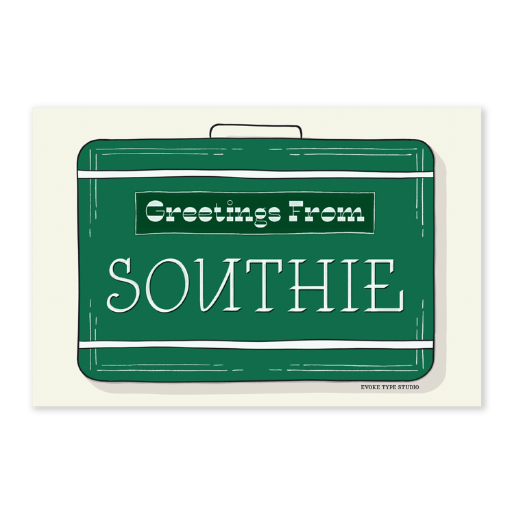 A postcard of a vintage style suitcase with the words “Greetings from Southie" drawn in unique lettering styles. Artwork has a green and white color scheme