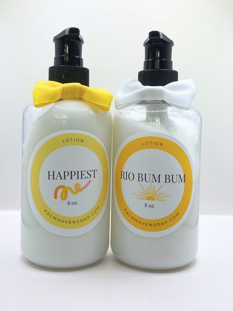 two bottles of handmade lotion in designer-type fragrances