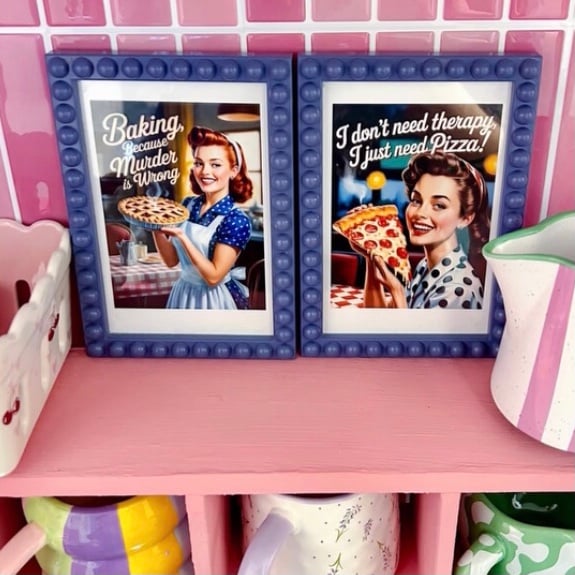 Two customer posters printed out for their kitchen