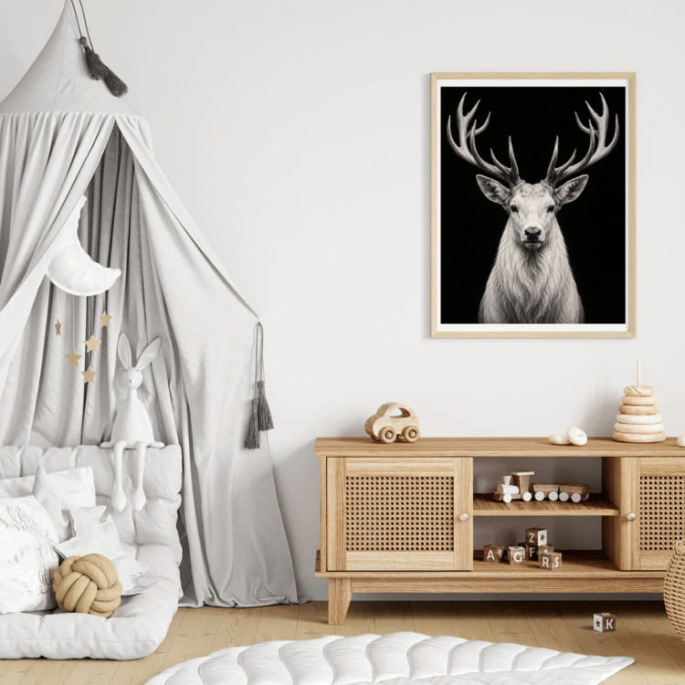 Detailed black and white portrait of a majestic white stag with symmetrical antlers against a dark background, printable wildlife wall art.