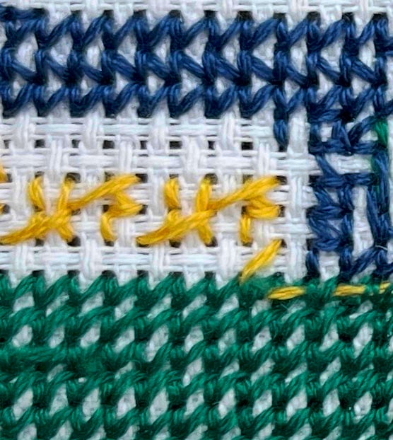 close up shot of back of work, showing different results of different methods of working