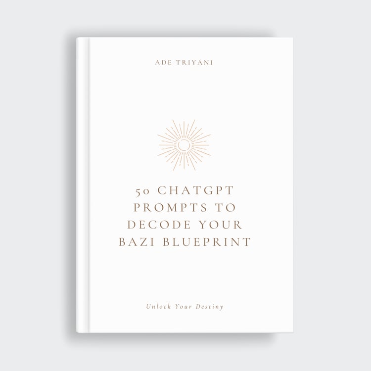 Hardcover book mockup titled '50 ChatGPT Prompts to Decode Your BaZi Blueprint: Unlock Your Destiny' by Ade Triyani, featuring a minimalist white cover with a gold sunburst icon.