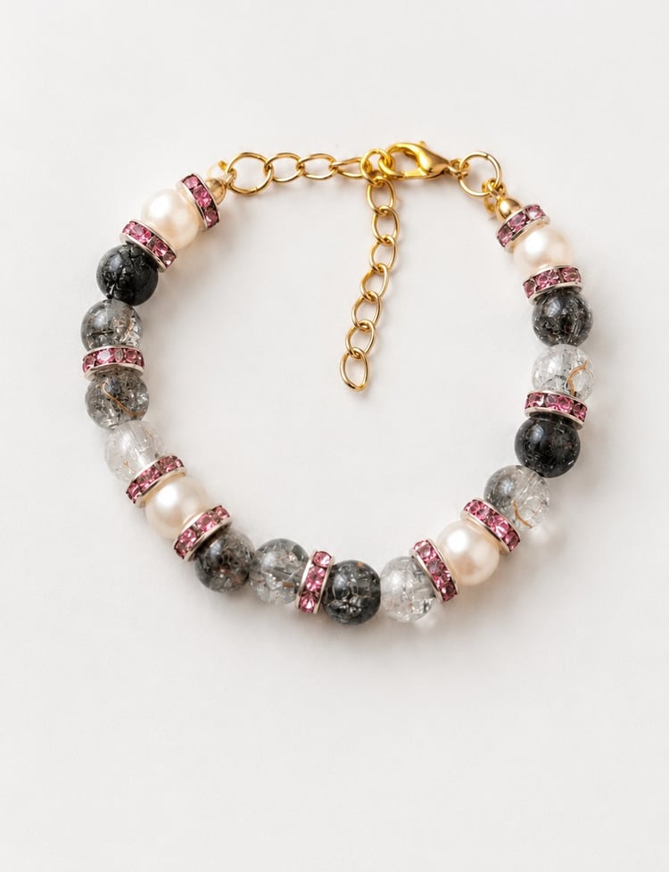 Handmade adjustable bracelet with smoky crackle glass beads, cream resin pearls, pink rhinestone spacers and gold-toned clasp