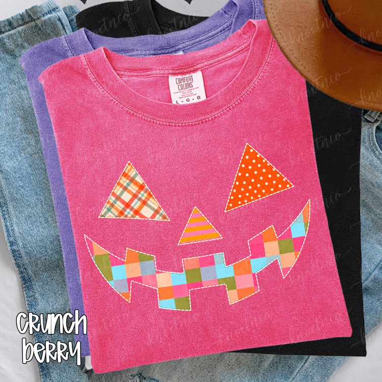 A soft Comfort Colors® tee featuring a colorful quilt-look jack-o’-lantern with playful patchwork patterns and faux stitched details. A cheerful choice for Halloween parties, pumpkin-patch trips, fall festivals, and everyday autumn outfits.