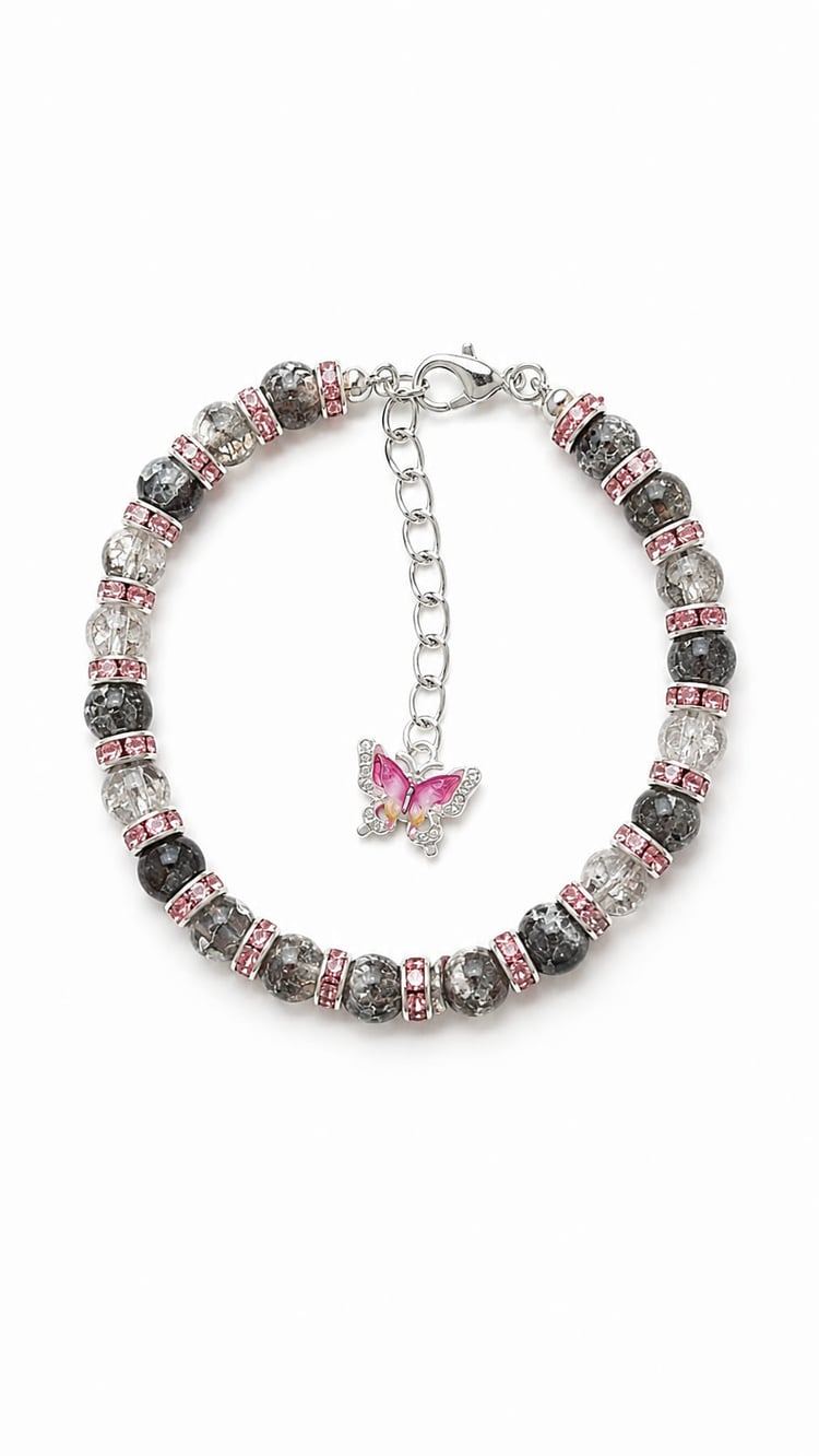 Handmade grey cracked-glass bracelet with pink rhinestone spacers and butterfly charm