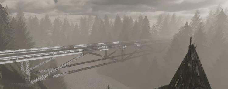 Foggy forest bridge crossing over a mountain river