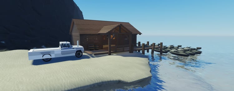 Coastal cabin with vintage pickup beside the ocean