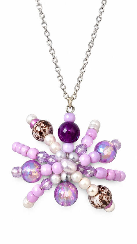 Close-up of handmade purple spider pendant with Amethyst, lilac, pearl and iridescent beads on a sterling silver chain.