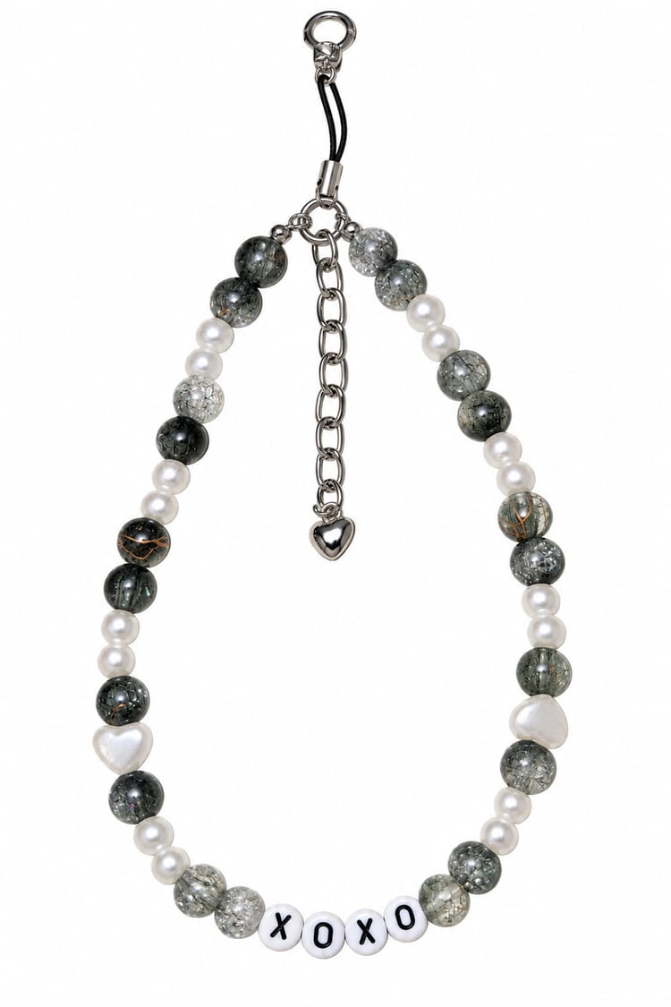 Handmade black and white XOXO beaded walking stick charm with pearl-style beads and silver heart charm