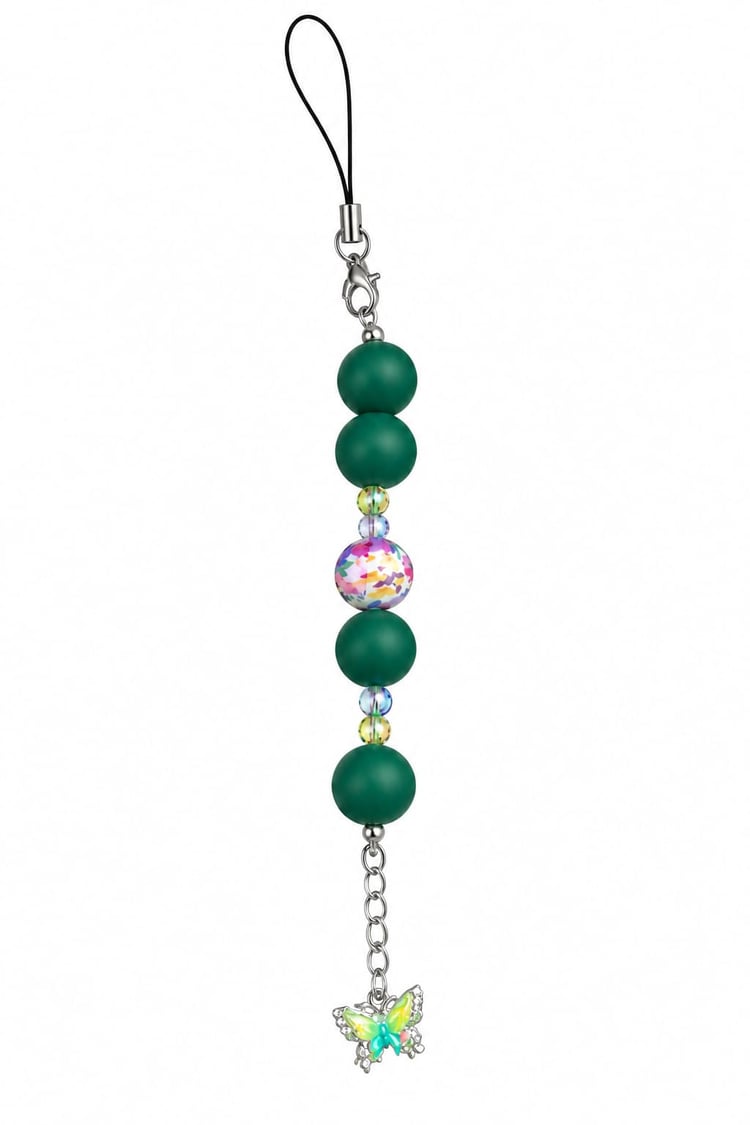 A close-up view of a novelty fidget strap charm showing dark green matte silicone beads, colorful iridescent crystal spacers, an abstract pink and purple floral focal bead, and a silver butterfly charm lined with rhinestones.
