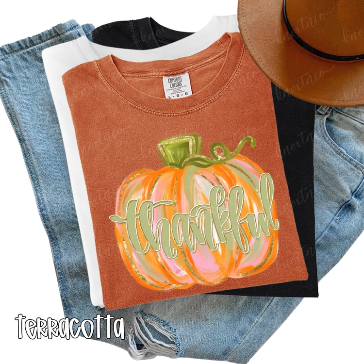 Comfort Colors T-shirt or Gildan sweatshirt featuring a fall Thanksgiving pumpkin design, available in unisex sizes Small through 3X and pressed in East Tennessee.