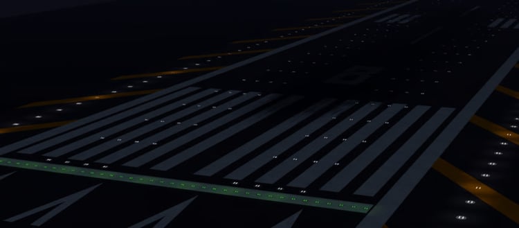 Long illuminated airport runway