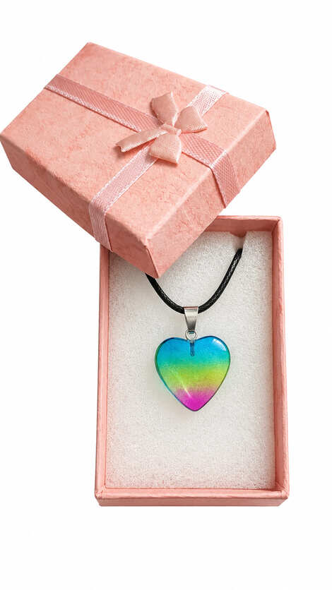 Rainbow aura natural stone heart necklace presented in an open pink jewellery gift box with matching satin ribbon bow.