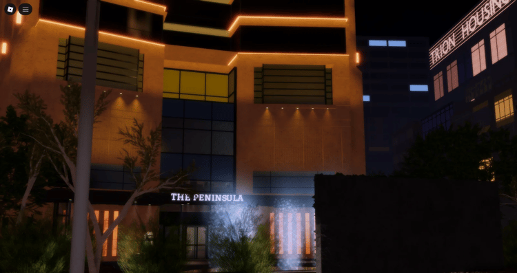 Hotel entrance with large exterior fountain