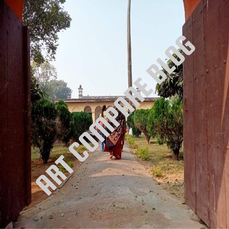 Two Women Tourists Walking Through Gateway Towards Yellow Mosque at Khushbagh - Murshidabad Historical Site