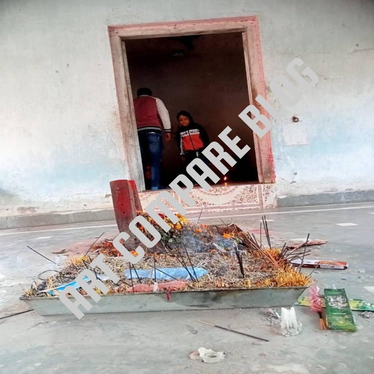 Incense Sticks and Flower Offerings at Small Havan Altar Outside Temple Sanctum Door with Devotees Inside - Murshidabad Temple Courtyard