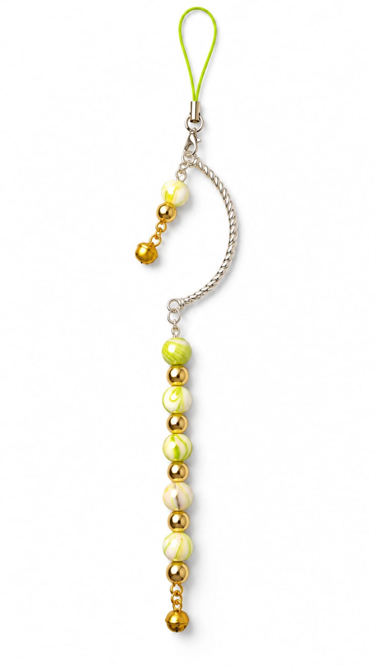 Handmade golden lime Christmas hanging decoration with green and white marbled beads, gold-tone beads, silver crescent and small jingle bells.