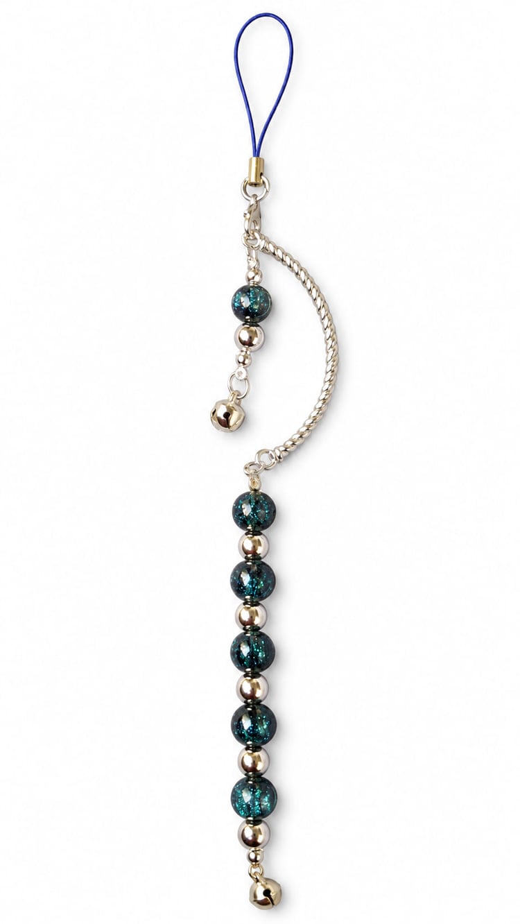 Handmade teal and silver beaded Christmas decoration with sparkling dark teal beads, polished silver beads, crescent bar and jingle bells.