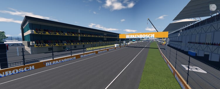 Asphalt corner with red and white racing curbs