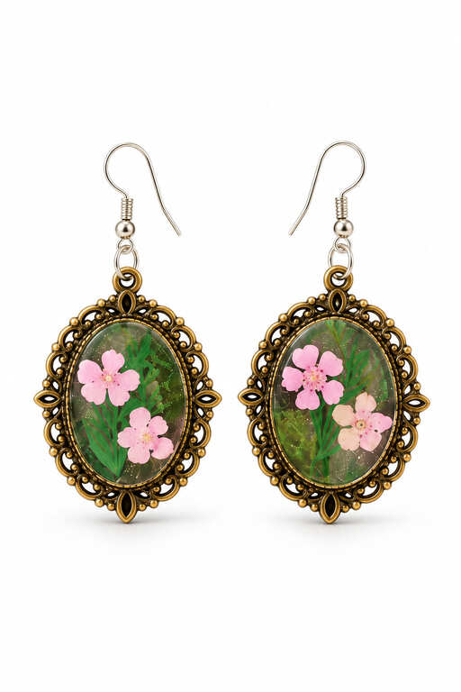 Real pink pressed flower resin drop earrings with green botanical details, ornate antique bronze-tone oval frames and 925 sterling silver ear hooks.